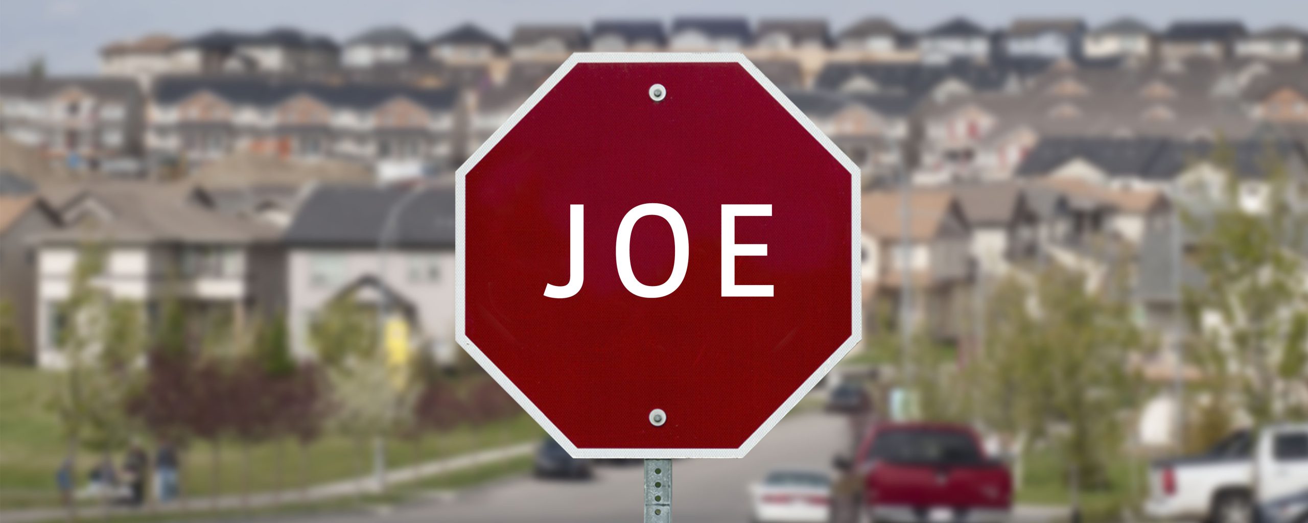 Stop Joe logo over city of Calgary suburb